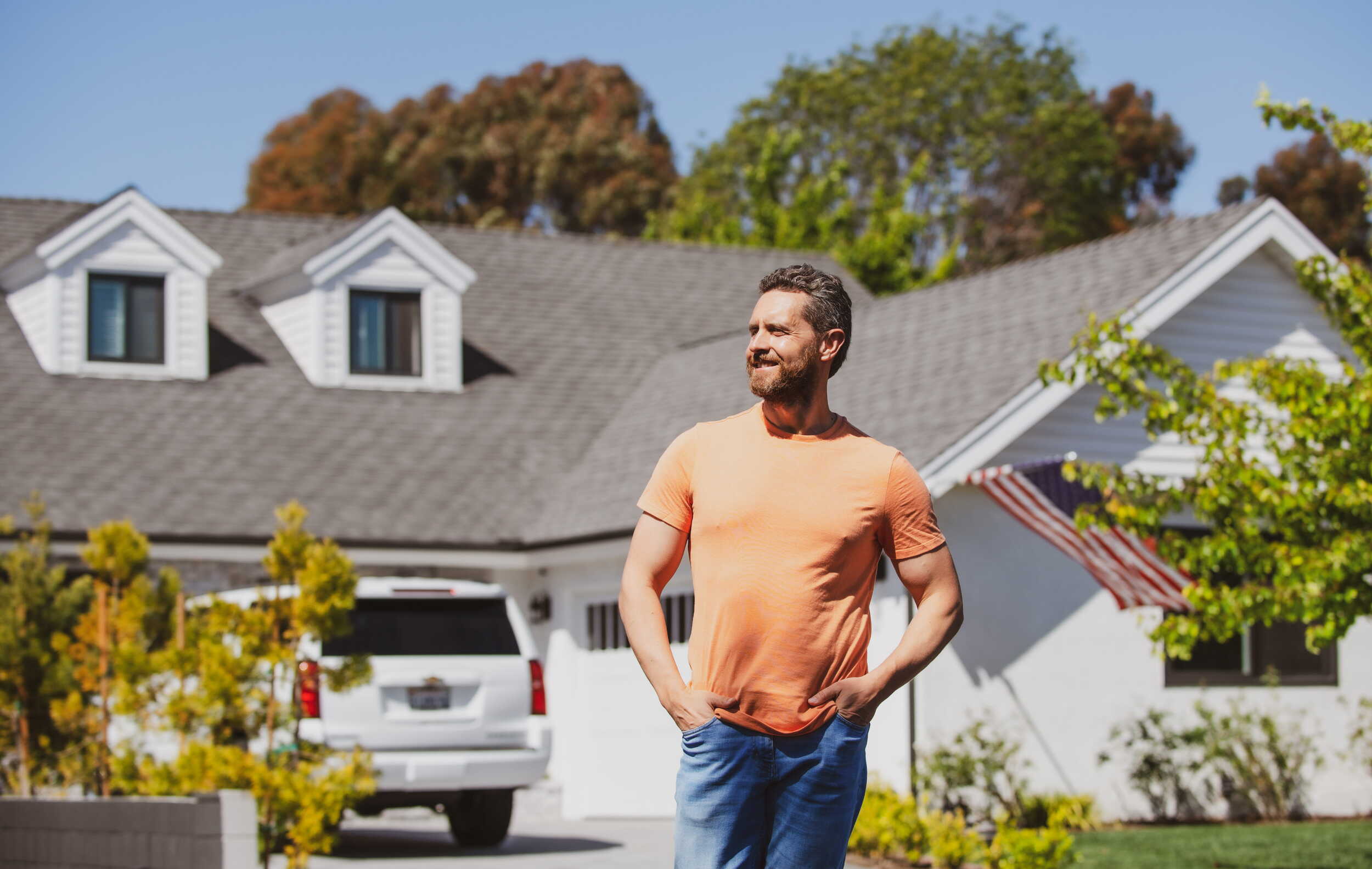 portrait-young-successful-realestate-agent-standing-outdoor-dwelling-sale-selling-houses-j